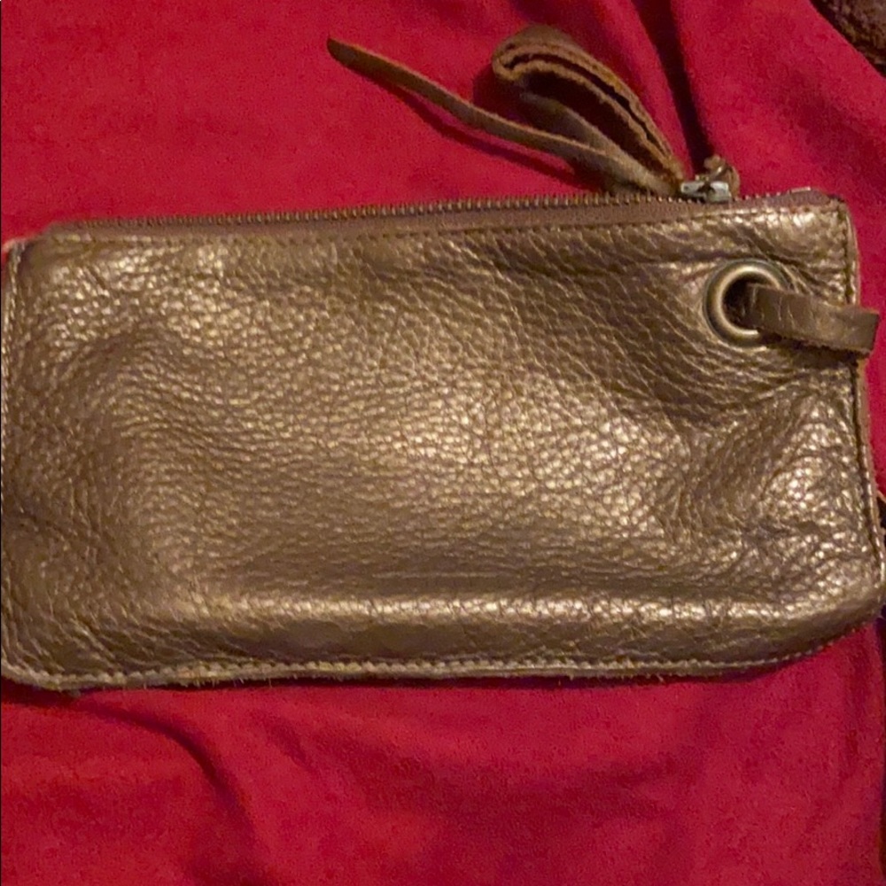 Roots leather mini wristlet in bronze